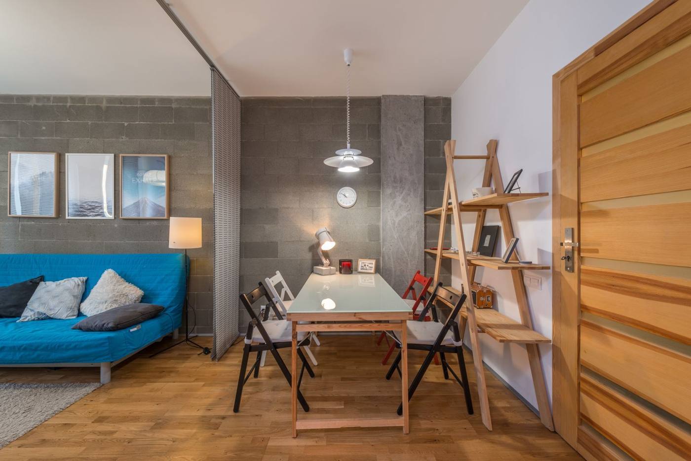 A bright, modern apartment interior, photographed for a real estate listing.