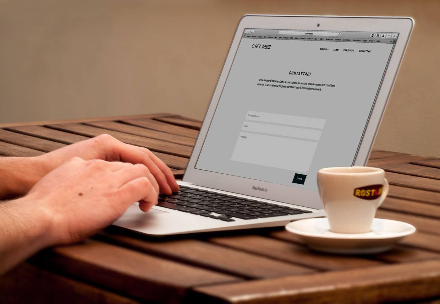 Entrepreneur reviews a brochure website design on a laptop screen