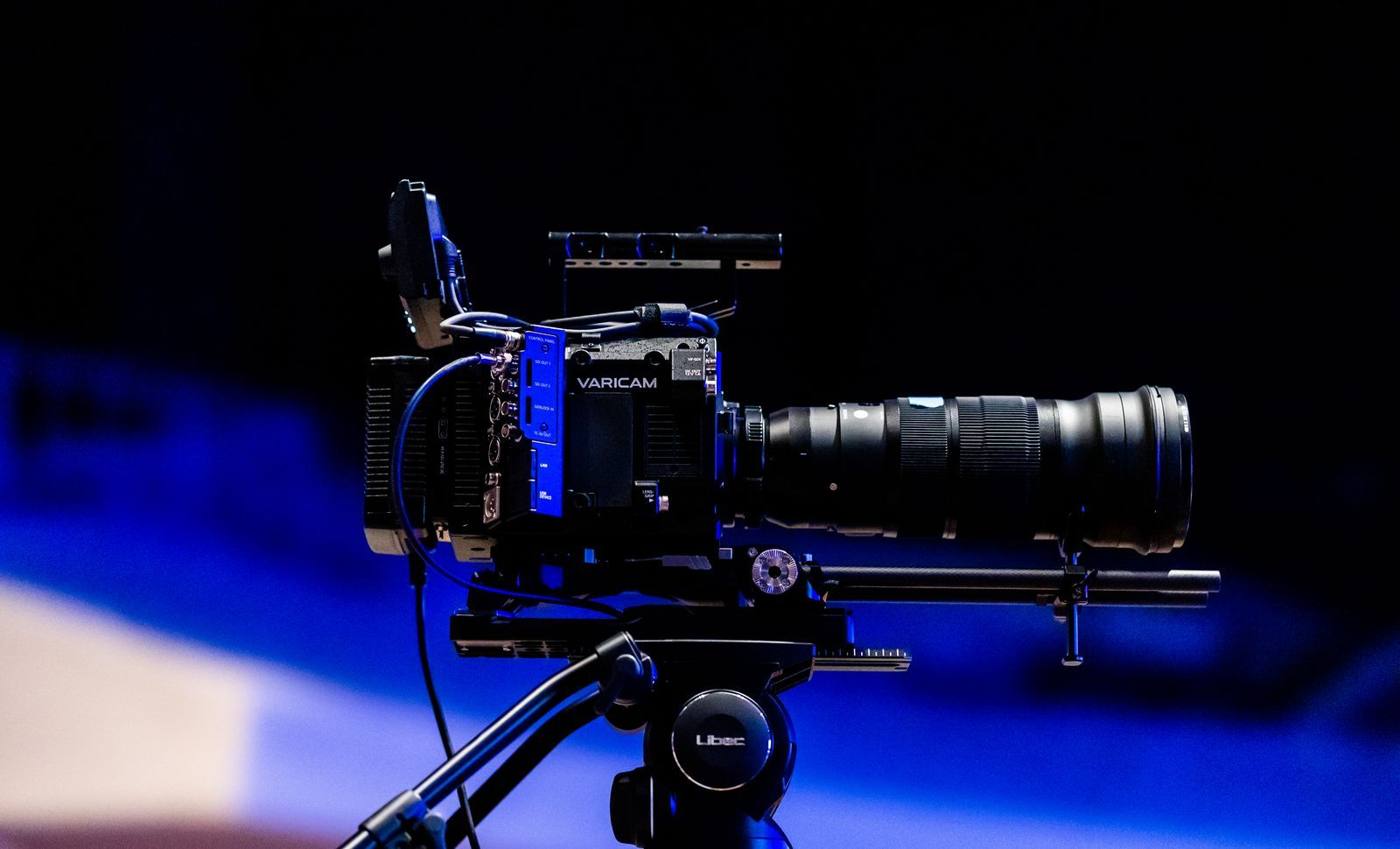 A video production set with filming and lighting equipment for product content.
