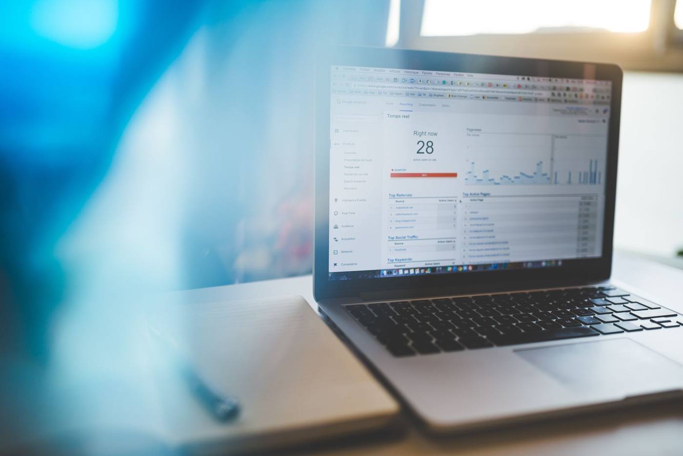 Entrepreneur checking the results of a Google Ads campaign on a laptop screen