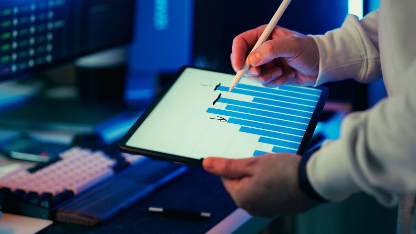 Team reviewing an AI agent's permissions on a screen, in an office