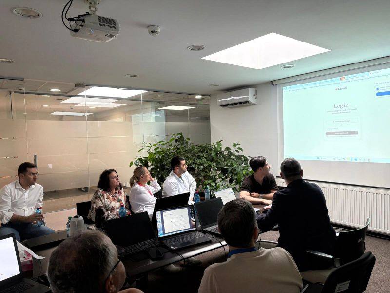 People from every department, laptops open: work on real cases, not on slides.